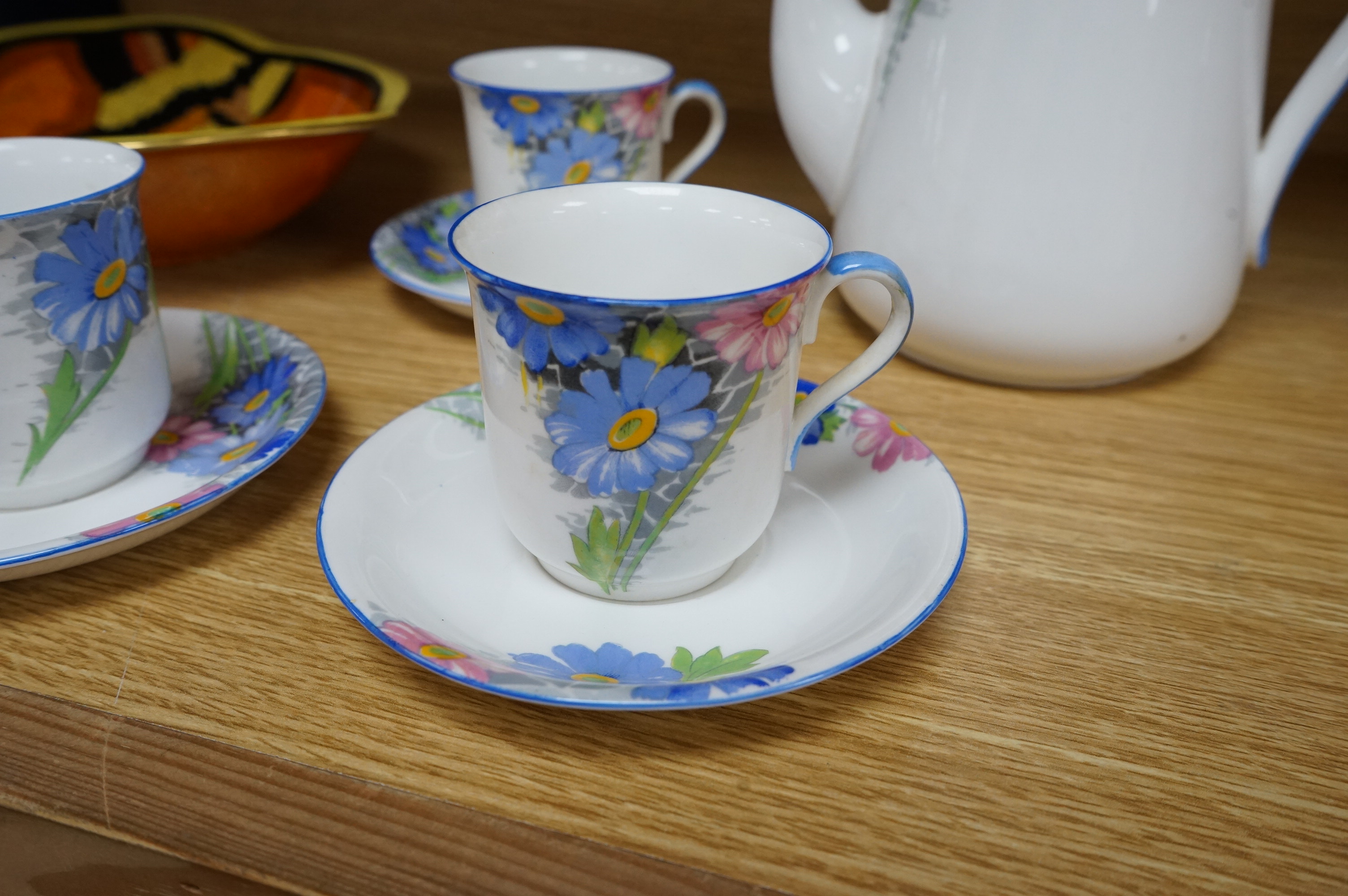 A Shelley porcelain coffee set and a Carltonware Jazz pattern dish, largest 23cm high. Condition - good